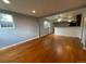 Bright and airy living room with hardwood floors and open concept at 1522 Tamarac St, Denver, CO 80220