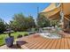 Spacious deck with shade sail, perfect for outdoor dining and relaxation at 1058 W Choke Cherry Dr, Louisville, CO 80027