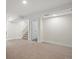 Spacious finished basement with carpeted floors at 6325 Martin Luther King Jr Blvd, Denver, CO 80207