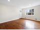 Bright living room with hardwood floors at 6325 Martin Luther King Jr Blvd, Denver, CO 80207