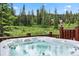 Hot tub on deck overlooking wooded area at 274 Cr 672, Breckenridge, CO 80424