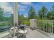 Private deck with scenic views and small table and chairs at 701 Golf Club Dr, Castle Rock, CO 80108