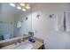 Clean bathroom with granite vanity, updated fixtures, and plenty of storage at 465 Four Oclock Rd # 323, Breckenridge, CO 80424