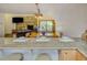 Open concept kitchen with breakfast bar that overlooks the living room at 465 Four Oclock Rd # 323, Breckenridge, CO 80424