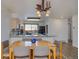 Bright kitchen with granite countertops and wood cabinetry at 465 Four Oclock Rd # 323, Breckenridge, CO 80424