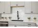 Modern kitchen sink with a sleek black faucet at 10062 W Victoria Pl # 303, Littleton, CO 80127