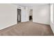 Spacious bedroom with access to bathroom and hallway at 7302 Arkansas Street, Frederick, CO 80530