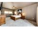 Spacious Primary bedroom with hardwood floors and ceiling fan at 32651 Buffalo Creek Rd, Evergreen, CO 80439
