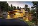 Stunning contemporary home with mountain views, expansive windows, and a spacious driveway at 32651 Buffalo Creek Rd, Evergreen, CO 80439
