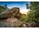 Scenic mountain view with large rocks and a chair, offering tranquil setting at 32651 Buffalo Creek Rd, Evergreen, CO 80439