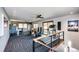 Home studio or gym with a drum set, treadmill and office area at 32651 Buffalo Creek Rd, Evergreen, CO 80439