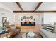 Modern kitchen with a large island, white cabinets, and hardwood floors at 428 S Williams St, Denver, CO 80209