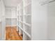 Large walk-in closet with ample shelving and hanging space at 428 S Williams St, Denver, CO 80209