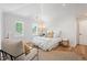 Spacious bedroom with hardwood floors and plenty of natural light at 428 S Williams St, Denver, CO 80209