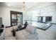 Upstairs game room with comfortable seating and a racing simulator at 4960 S Lipan Dr, Englewood, CO 80110
