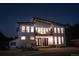 Modern two-story house exterior, illuminated at night at 4960 S Lipan Dr, Englewood, CO 80110