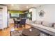 Open concept kitchen and living area with modern appliances at 4960 S Lipan Dr, Englewood, CO 80110