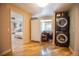 Convenient laundry room with washer, dryer, and extra storage space at 4960 S Lipan Dr, Englewood, CO 80110
