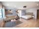 Spacious main bedroom with hardwood floors and sitting area at 4960 S Lipan Dr, Englewood, CO 80110