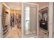 Large walk-in closet with ample shelving and hanging space at 4960 S Lipan Dr, Englewood, CO 80110