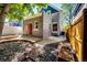 Backyard view showing house exterior, patio, and garden at 212 S Sherman St, Denver, CO 80209