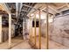 Unfinished basement with plumbing, HVAC, and storage space at 212 S Sherman St, Denver, CO 80209