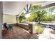 Covered front porch with seating area at 212 S Sherman St, Denver, CO 80209