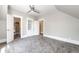 Charming bedroom with grey carpet and ample closet space at 212 S Sherman St, Denver, CO 80209