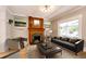 Living room featuring a fireplace and hardwood floors at 212 S Sherman St, Denver, CO 80209