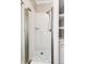 Modern shower with glass enclosure and hexagon tiles at 212 S Sherman St, Denver, CO 80209