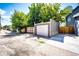 View of detached single car garage in alley at 212 S Sherman St, Denver, CO 80209