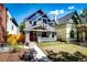 Renovated craftsman home with front porch at 212 S Sherman St, Denver, CO 80209