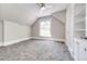 Spacious bedroom featuring grey carpet, built-in shelving, and a ceiling fan at 212 S Sherman St, Denver, CO 80209