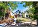 Two-story craftsman style home with landscaping at 212 S Sherman St, Denver, CO 80209