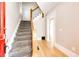 Bright entryway with hardwood floors and staircase at 212 S Sherman St, Denver, CO 80209