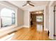 Light-filled dining room with hardwood floors and arched window at 212 S Sherman St, Denver, CO 80209