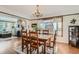 Bright dining room with hardwood floors and a charming chandelier at 665 S Gilpin St, Denver, CO 80209