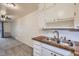 Kitchen with butcher block countertops and stainless steel appliances at 655 S Clinton St # 10B, Denver, CO 80247