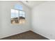 Charming bedroom with carpet and large window with a view at 1423 Turnberry Pl, Castle Rock, CO 80104