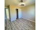 Well-lit bedroom with a large closet and wood-look floors at 11205 Ash Cir, Thornton, CO 80233