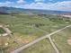 Aerial view showing expansive property and mountain views at 8045 N Moore Rd, Littleton, CO 80125