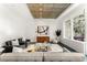 Modern living room with exposed ceiling and natural light at 1648 Little Raven St, Denver, CO 80202