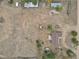 Aerial view of property showing house, yard, and outbuildings at 1251 Bailey Dr, Brighton, CO 80603