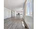 Open concept kitchen and living area with hardwood floors at 3282 N Highlands Creek Pkwy, Aurora, CO 80019