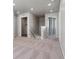 Upper hallway with carpet, linen closet, and bedrooms at 3282 N Highlands Creek Pkwy, Aurora, CO 80019