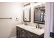 Elegant bathroom with double vanity and modern fixtures at 3790 S Roslyn Way, Denver, CO 80237