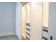 Large walk-in closet with built-in shelves and drawers at 3790 S Roslyn Way, Denver, CO 80237