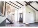Bright and spacious entryway with double doors and hardwood floors at 3790 S Roslyn Way, Denver, CO 80237