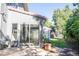 Stone patio adjacent to house, access from sliding glass door at 3790 S Roslyn Way, Denver, CO 80237