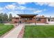 Home with covered patio, hot tub, and fenced yard at 9941 Ammons Cir, Broomfield, CO 80021